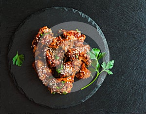 Glazed pork with homemade sauce made from onions, garlic, tomatoes, mustard, vinegar, honey, soy sauce and sesame seeds.