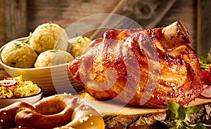 Glazed roasted pork hock or knuckle photo