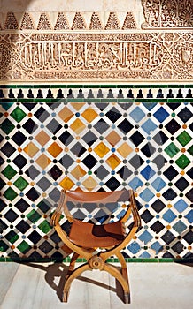 Glazed tiles, azulejos, plasterwork, Alhambra palace in Granada, Spain photo