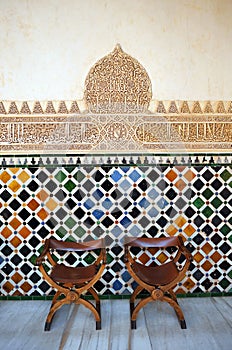 Glazed tiles, azulejos, plasterwork, Alhambra palace in Granada, Spain photo