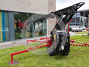 Glazier operating glass installation crane