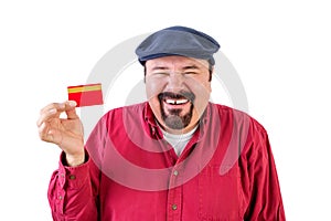 Gleeful man holding up a bank card