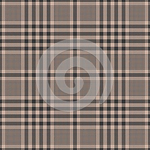 Glen plaid pattern autumn in brown and beige. Seamless textured hounds tooth tweed dark check plaid graphic for jacket, trousers.