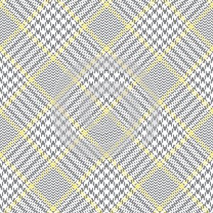 Glen plaid pattern in grey  yellow  white. Seamless hounds tooth tweed check plaid background for coat  skirt  jacket  trousers.