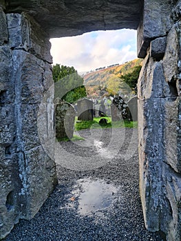 GLENDALOUGH Cemetery and Tower. Monastic site in Wicklow mountains,Ireland