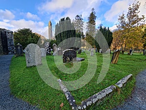 GLENDALOUGH Cemetery and Tower. Monastic site in Wicklow mountains,Ireland