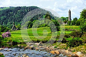 Glendalough monastic site with ancient round tower and church, Wicklow National Park, Ireland photo