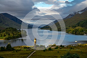 Glenfinnan Monument and Loch Shiel lake. Highlands Scotland Uk