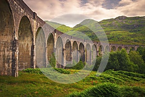 Glenfinnan railway viaduct in Scotland with the Jacobite steam t