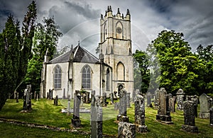 Glenorchy Parish Church and headstones at graveyard in Dalmally Scotland