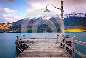 Glenorchy wharf wooden pier and lamp after sunrise