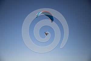 glider paragliding g against blue sky flying  adrenaline and freedom concept