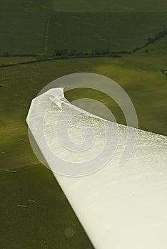 Glider wing in rain shower