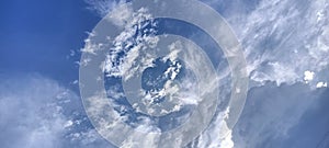 A Glimmer of Blue in the Cloudy Vastness