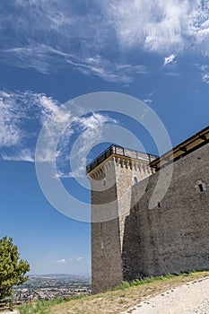 A glimpse of the external walls of the Rocca Albornoziana in the historic center of Spoleto, Italy