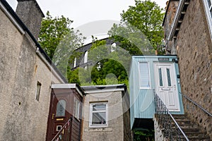 Glimpse of McCaig\'s Tower through neighborhood in Oban, Scotland