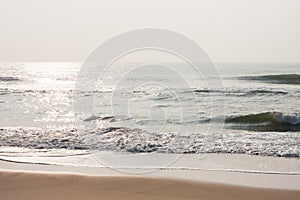 Glistening water on beach