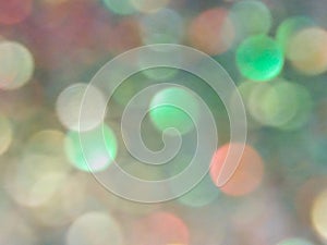 Glitter clear pattern on colorful rainbow defocus background. Holiday boke