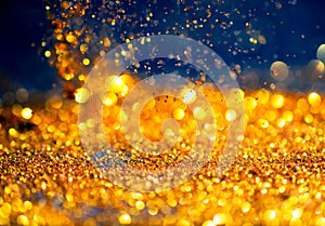 glitter gold lights grunge background, glitter defocused abstract Twinkly Lights Stars Christmas light Background..