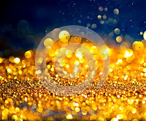 glitter gold lights grunge background, glitter defocused abstract Twinkly Lights Stars Christmas light Background..