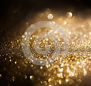 Glitter lights grunge background, gold glitter defocused abstract Twinkly gold Lights Background