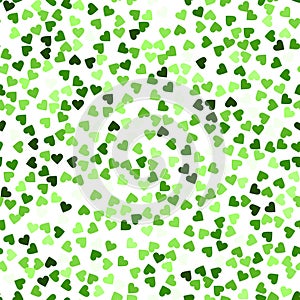 Glitter seamless texture. Actual green particles. Endless pattern made of sparkling hearts. Mesmeric photo