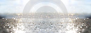 Glitter silver and gild lights background. de-focused