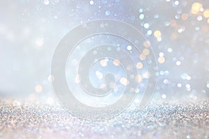 Glitter silver and gild lights background. de-focused