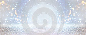 Glitter silver and gild lights background. de-focused