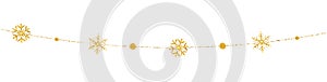 Glitter snowflakes garland on white background. Christmas golden decoration. Bright hanging snowflake and balls. Holiday