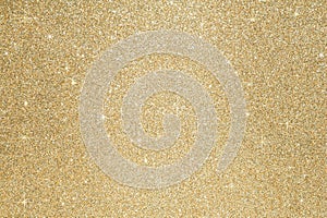 Glitter sparkle gold background Defocused abstract gold lights on background