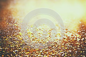 glitter vintage gold lights background. defocused