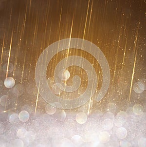 Glitter vintage lights background. abstract gold background. defocused.