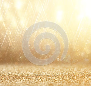 Glitter vintage lights background. abstract gold background . defocused