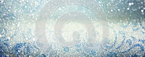 Glitter vintage lights background. blue, silver and black. defoc