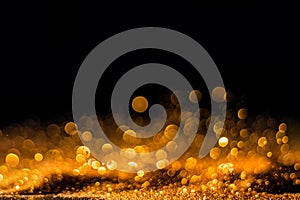 Glitter vintage lights background. gold and black. de focused