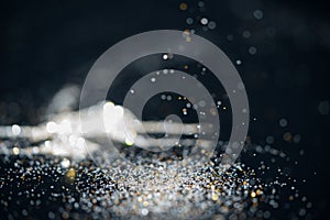 Glitter vintage lights background. gold, silver, abstract lights luxury bokeh background. defocused