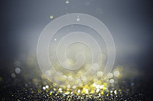 Glitter vintage lights background. gold, silver, abstract lights luxury bokeh background. defocused