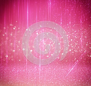 Glitter vintage lights background. light silver, and pink. defocused.