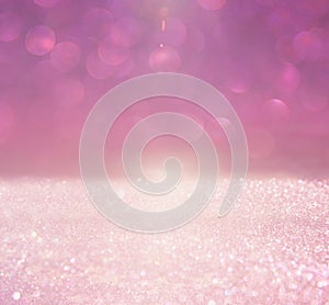 Glitter vintage lights background. pink and silver. defocused.