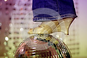 Glitterball and shoe
