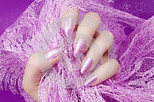 Glittered pink nails manicure