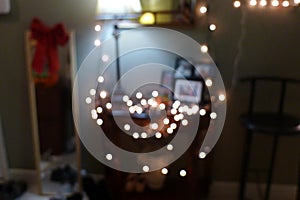 Glittering Christmas lights with Christmas ornament and albums