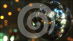 Glittering disco ball against bokeh background. Dancing or party related background. 3D rendering