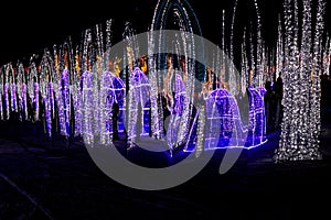 Glitzy ice shining in colors - modern light show photo