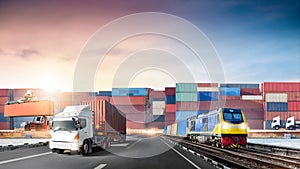 Global business logistics import export of red container truck on highway and freight train at port cargo shipping dock yard