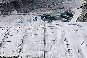 Global clima change: The Corvatsch-Glacier near St. Moritz covered in summertime