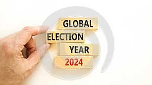 Global election year 2024 symbol. Concept words Global election year 2024 on beautiful block. Beautiful white table white