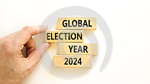 Global election year 2024 symbol. Concept words Global election year 2024 on beautiful block. Beautiful white table white