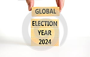 Global election year 2024 symbol. Concept words Global election year 2024 on beautiful block. Beautiful white table white